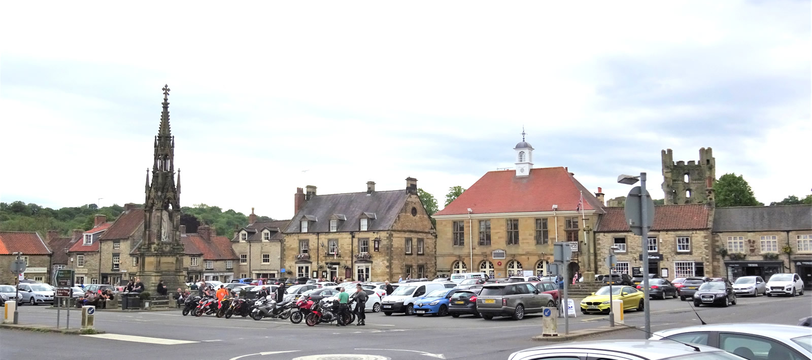 Motorcycles parked in the Town Square at Helmsley, Yorkshire, England - motorcbike tour Northern England