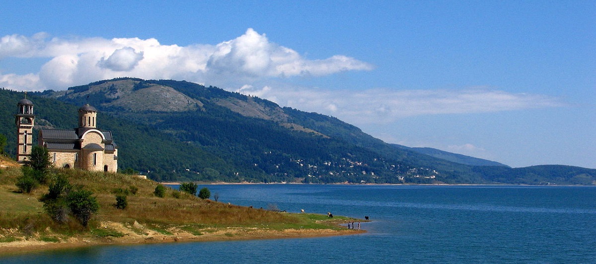 view with church on left and lake to right and around